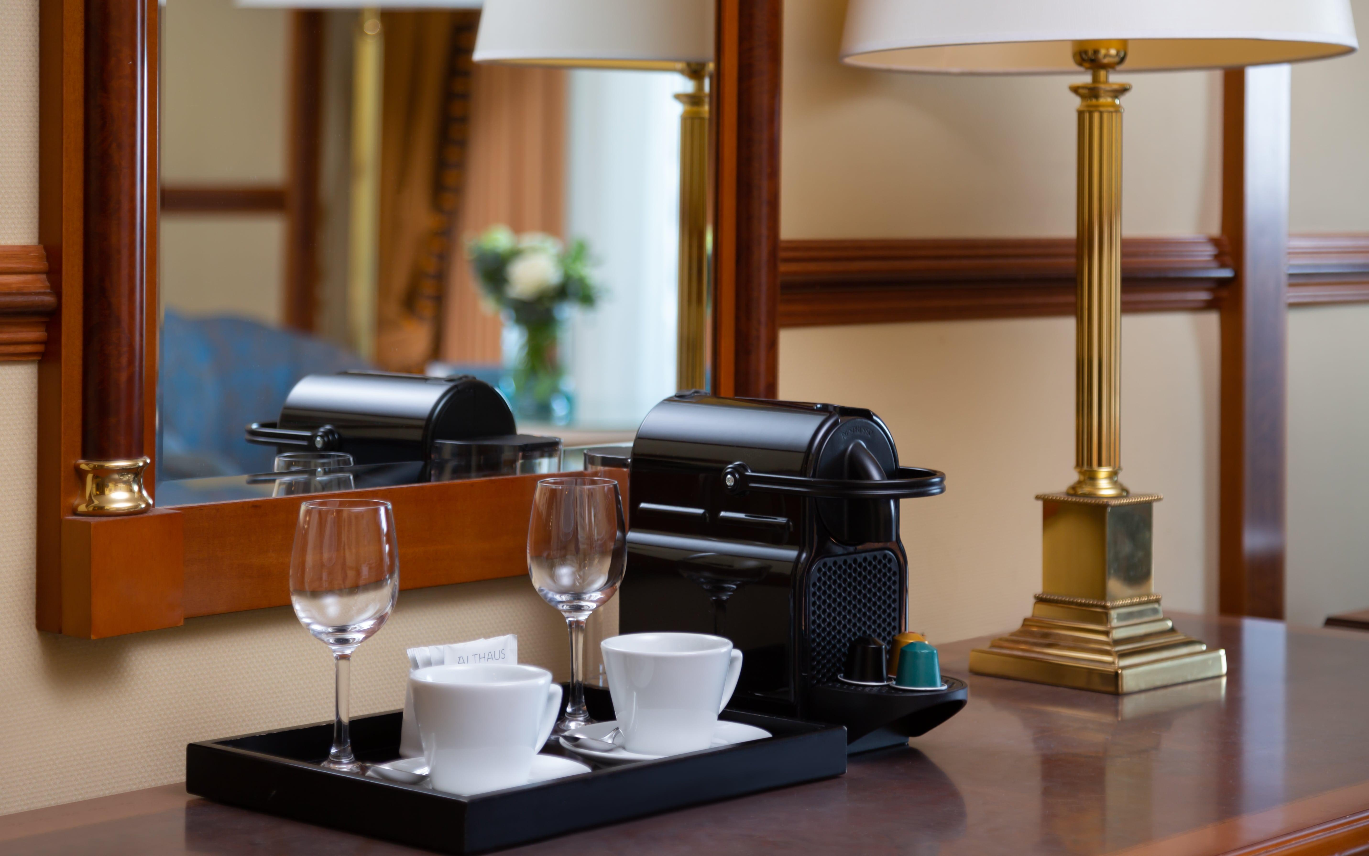 Grand Hotel Bucureşti Exterior foto A Nespresso coffee machine in a hotel room